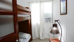 Postel nebo postele na pokoji v ubytování JSB Residences Cebu C-flat