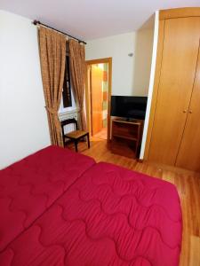 Postel nebo postele na pokoji v ubytování Hostal Prada Borges