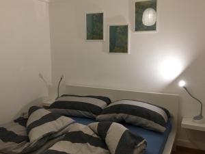 Postel nebo postele na pokoji v ubytování Bleu Bambou