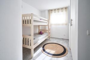 Łóżko lub łóżka w pokoju w obiekcie Casa Bianca