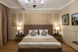 Letto o letti in una camera di Omart Hotel - Gallery