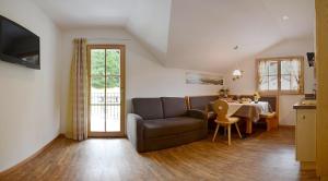 TV a/nebo společenská místnost v ubytování B&B Appartments Cudlea
