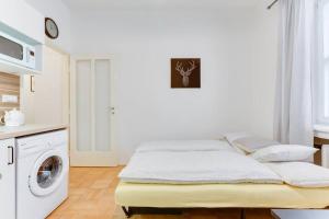 Posteľ alebo postele v izbe v ubytovaní Apartment Alex