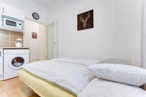 Posteľ alebo postele v izbe v ubytovaní Apartment Alex