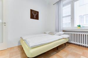 Posteľ alebo postele v izbe v ubytovaní Apartment Alex