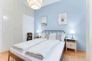 Posteľ alebo postele v izbe v ubytovaní Apartment Alex