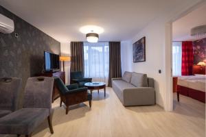 Posezení v ubytování Derby Apart Hotel