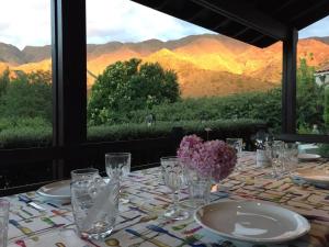 Un restaurant u otro lugar para comer en Zolara Di Merlo