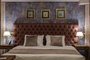 Letto o letti in una camera di Omart Hotel - Gallery