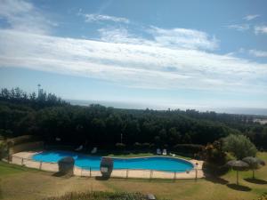 Πισίνα στο ή κοντά στο Departamento Mantagua