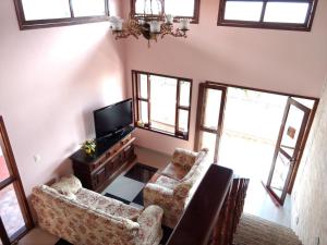 Et tv og/eller underholdning på Casa Premium Entre o Verde e o Mar