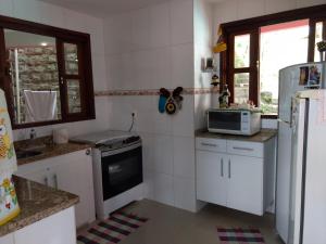 Køkken eller tekøkken på Casa Premium Entre o Verde e o Mar