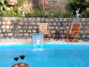 Swimmingpoolen hos eller tæt på Casa Premium Entre o Verde e o Mar