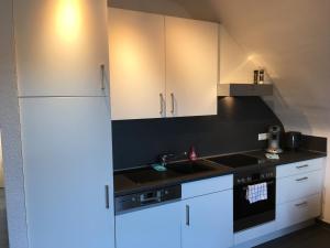 Kuchyň nebo kuchyňský kout v ubytování Ferienhaus Talblick
