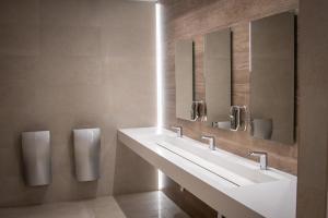 Koupelna v ubytování Hotel Club Cala Romani