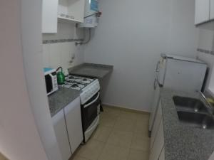 Una cocina o kitchenette en departamento catalina