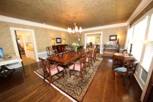 a dining room with a table and chairs at Leonard at Logan House in Grand Rapids