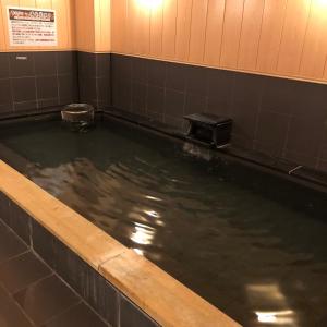 a large pool of water in a room withuming at Hotel Tsukuba Hills Gakuen-odori in Tsukuba