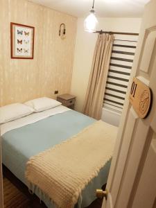 Cama o camas de una habitación en Abriga Bed and Breakfast