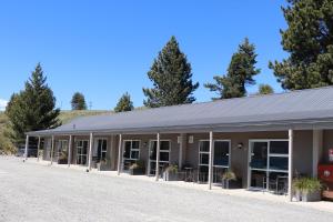 
a large building with a lot of windows on top of it at Lake Tekapo Motels & Holiday Park in Lake Tekapo
