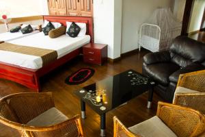 Posezení v ubytování Dew Lee Homestay & Farm House