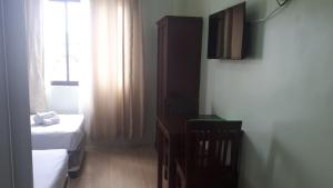 Katil atau katil-katil dalam bilik di Adams View Hotel