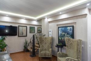 Area soggiorno di Omart Hotel - Gallery