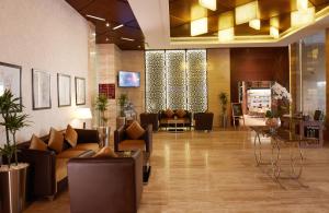 Χώρος καθιστικού στο Treppan Hotel & Suites By Fakhruddin
