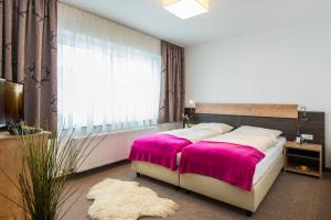 Postel nebo postele na pokoji v ubytování smartFLATS