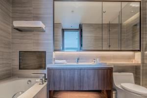 Koupelna v ubytování Oakwood Residence Damei Beijing