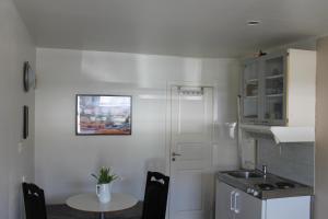 Kuchyň nebo kuchyňský kout v ubytování Lavilla Guesthouse
