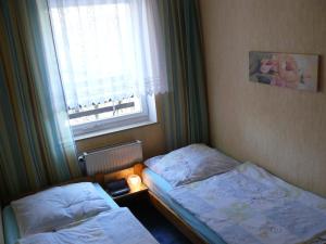 Postel nebo postele na pokoji v ubytování Ferienwohnungen Markgraf