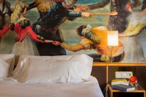 Postel nebo postele na pokoji v ubytování Hotel Goya