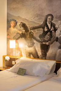 Postel nebo postele na pokoji v ubytování Hotel Goya