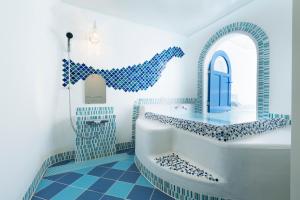 Kylpyhuone majoituspaikassa Hotel Sea Shell