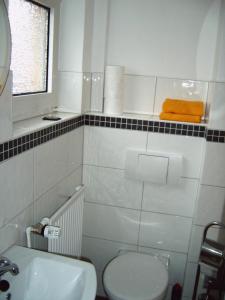 Ванная комната в Gästehaus UP-Arnold