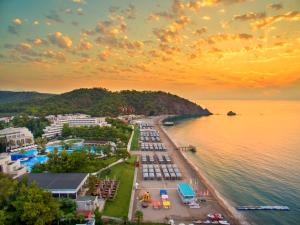 an aerial view of a beach at sunset at Rixos Premium Tekirova - The Land of Legends Access in Tekirova