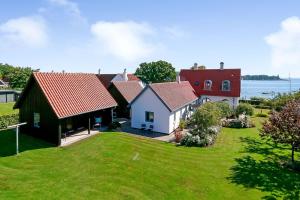 an aerial view of a house with a yard at Troense Bed and Breakfast by the sea in Svendborg