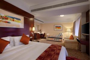 Televiisor ja/või meelelahutuskeskus majutusasutuses Hotel Royal Macau