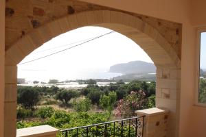 a view from the balcony of a house at Romantica Apartments in Falasarna
