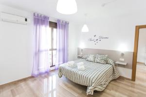 Postel nebo postele na pokoji v ubytování C&V Apartamentos - Horno de Marina