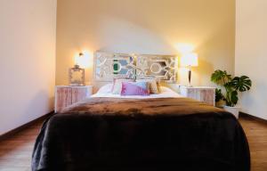 מיטה או מיטות בחדר ב-Big and Bright Apartment BCN
