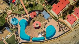 an overhead view of a resort with a pool at Macdonald Doña Lola Resort in La Cala de Mijas