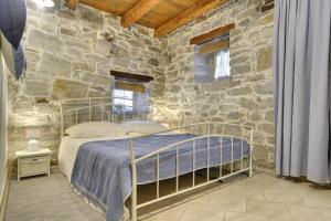 Posteľ alebo postele v izbe v ubytovaní Holiday Home Ruža