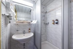 Koupelna v ubytování Hotel Alpenrose