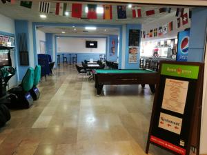 a store with a pool table in the middle of a room at Apartamento Salou, playas, piscina in Salou