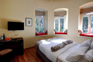 מיטה או מיטות בחדר ב-Tekla Palace By Urban Hotels