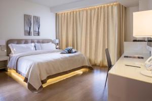 Letto o letti in una camera di O Monot Boutique Hotel Beirut