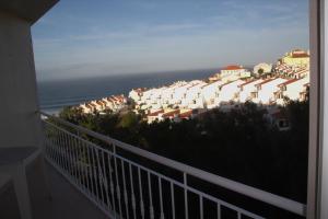a view from the balcony of a resort at Ericeira Sunset Apartment in Ericeira