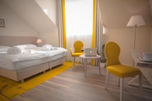 Postel nebo postele na pokoji v ubytování Hotel SPA Wieniawa